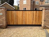 Gate 13 Cantilever Sliding Hard Wood Electric Gate  Doncaster