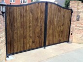 Gate T16 large hardwood steel frame automated gate with FAAC 24 volt hydraulic gate motors and GSM lntercom keypad combination. Edenthorpe South Yorkshire 