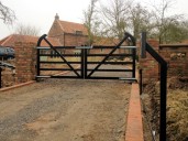 Gate 38 automated farm style five bar gate on 24 volt underground hydraulic gate motors and GSM intercom and key pad. Gringley Retford 